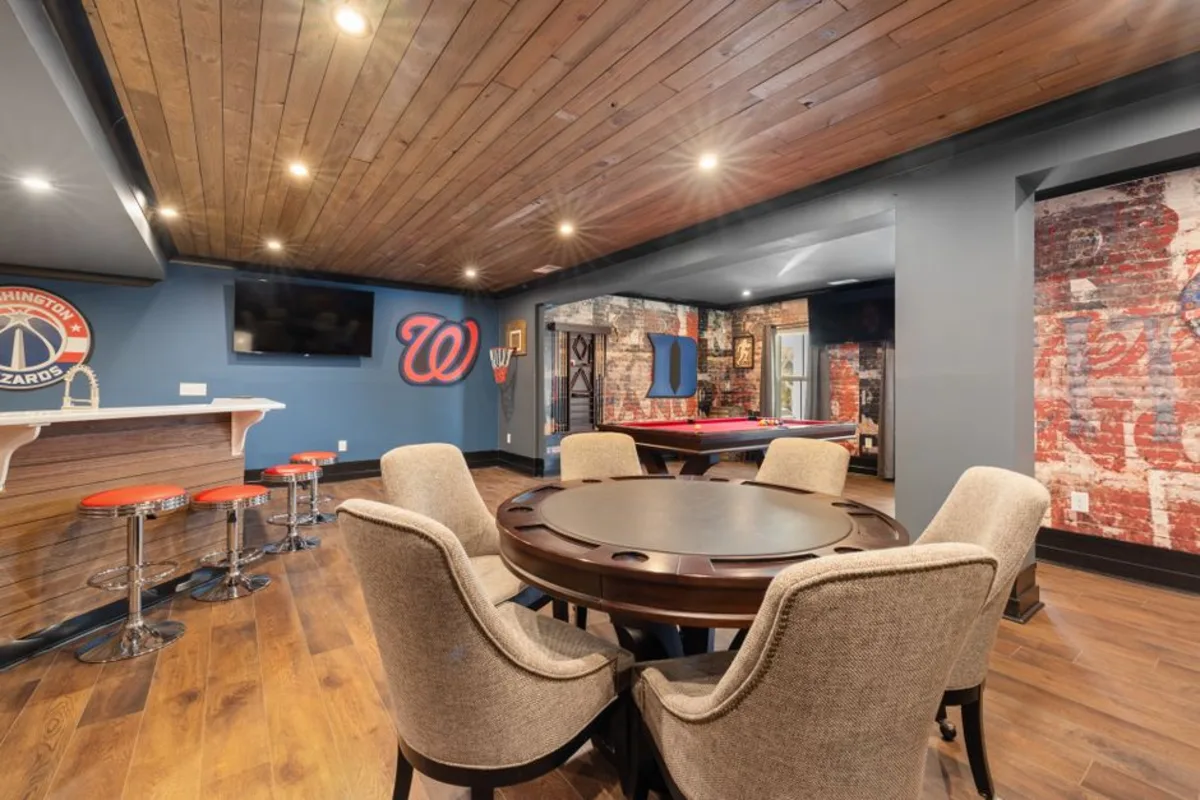 Completed finished basement by Wolf Carpenters in Swampscott, MA by Wolf Carpenters