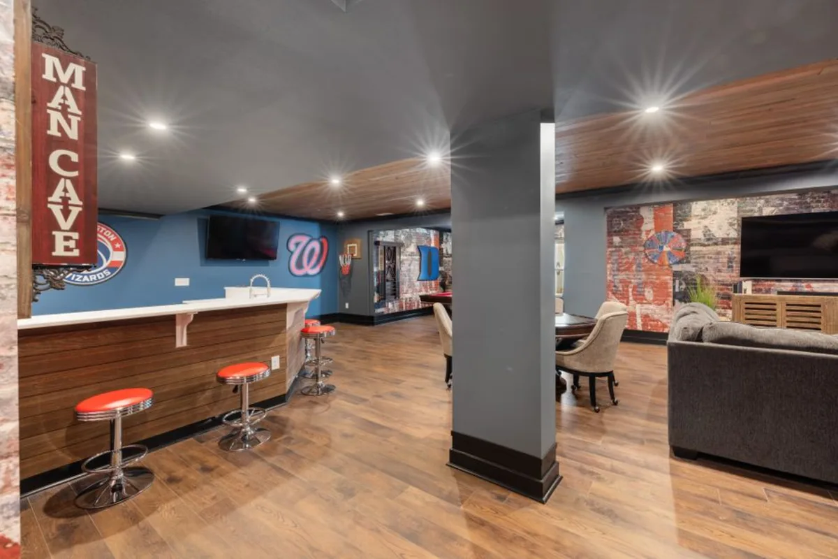 Finished basement living space in Middleton, MA by Wolf Carpenters