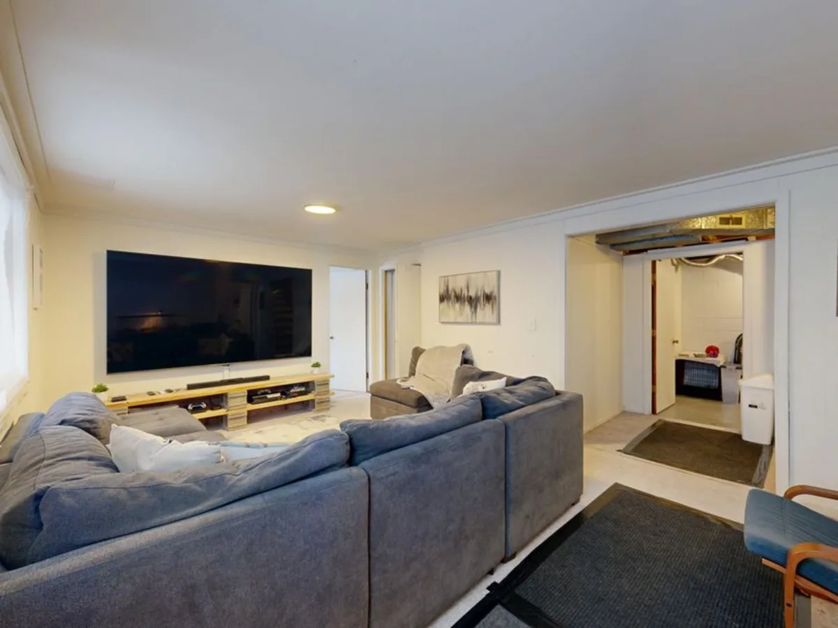 Finished basement media and family room in Swampscott, MA by Wolf Carpenters