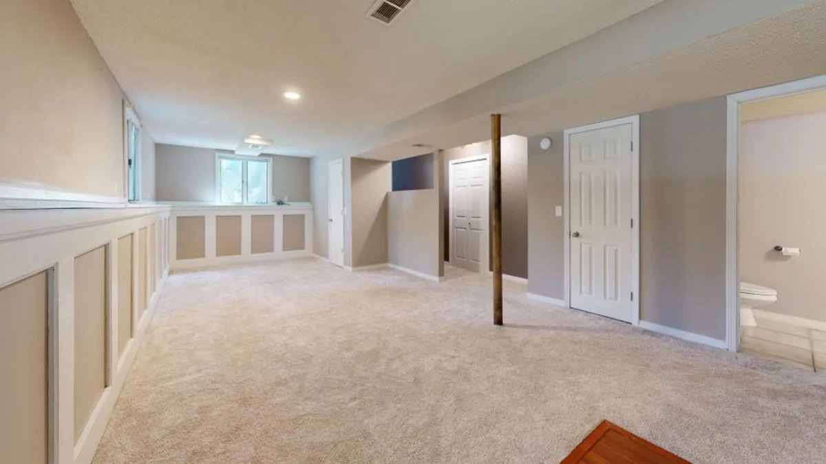 Completed finished basement by Wolf Carpenters in Middleton, MA by Wolf Carpenters
