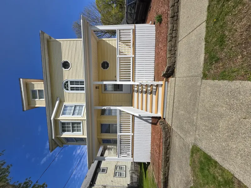 Completed deck build near Peabody, MA by Wolf Carpenters